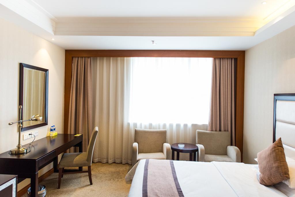 Vienna International Hotel - Expo Branch Shanghai Bagian luar foto