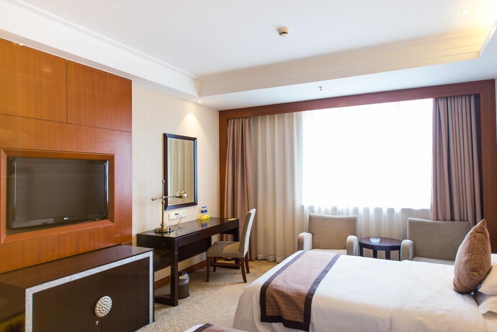 Vienna International Hotel - Expo Branch Shanghai Bagian luar foto