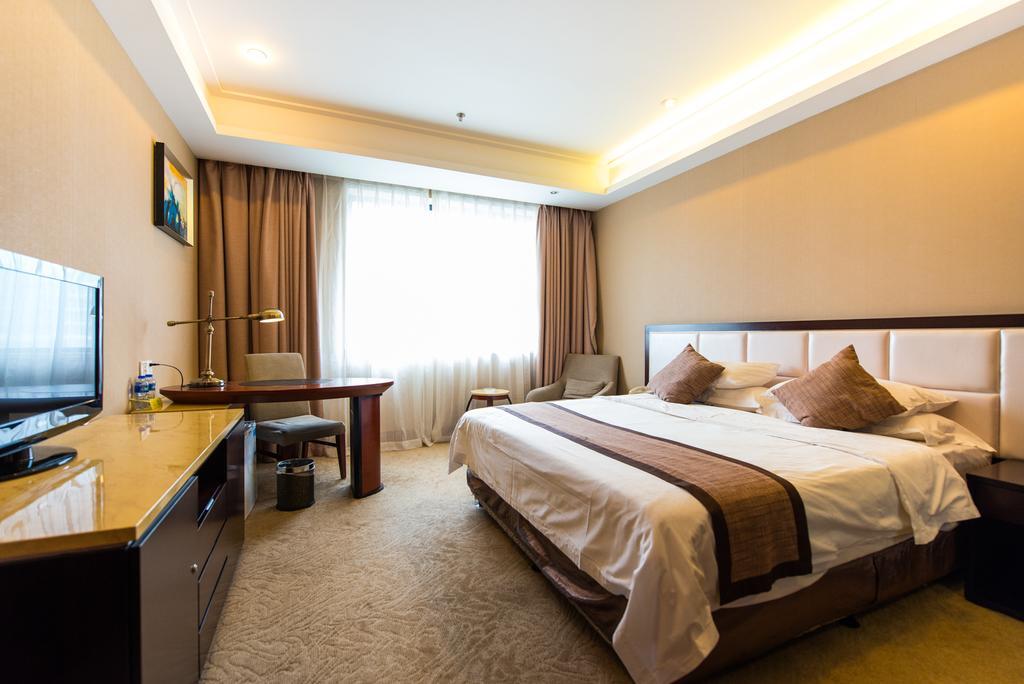 Vienna International Hotel - Expo Branch Shanghai Bagian luar foto
