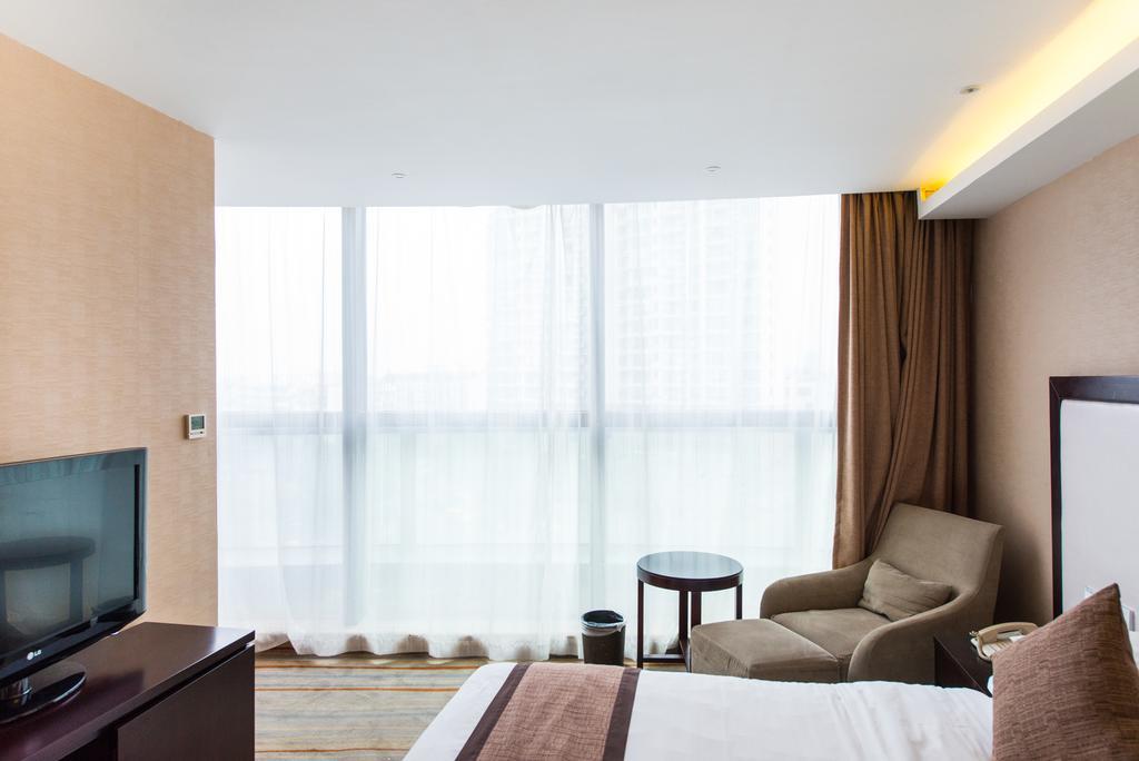Vienna International Hotel - Expo Branch Shanghai Bagian luar foto