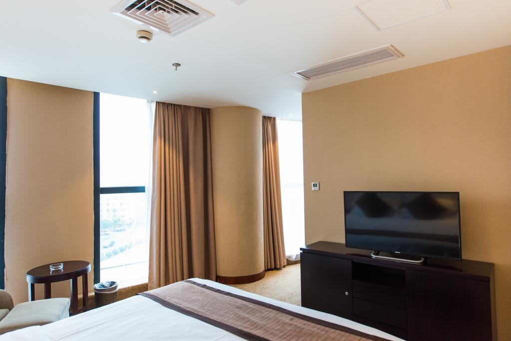 Vienna International Hotel - Expo Branch Shanghai Bagian luar foto