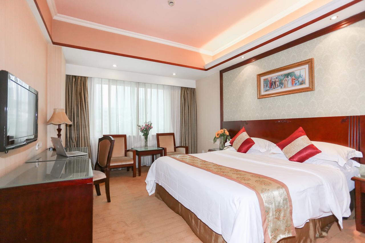Vienna International Hotel - Expo Branch Shanghai Bagian luar foto