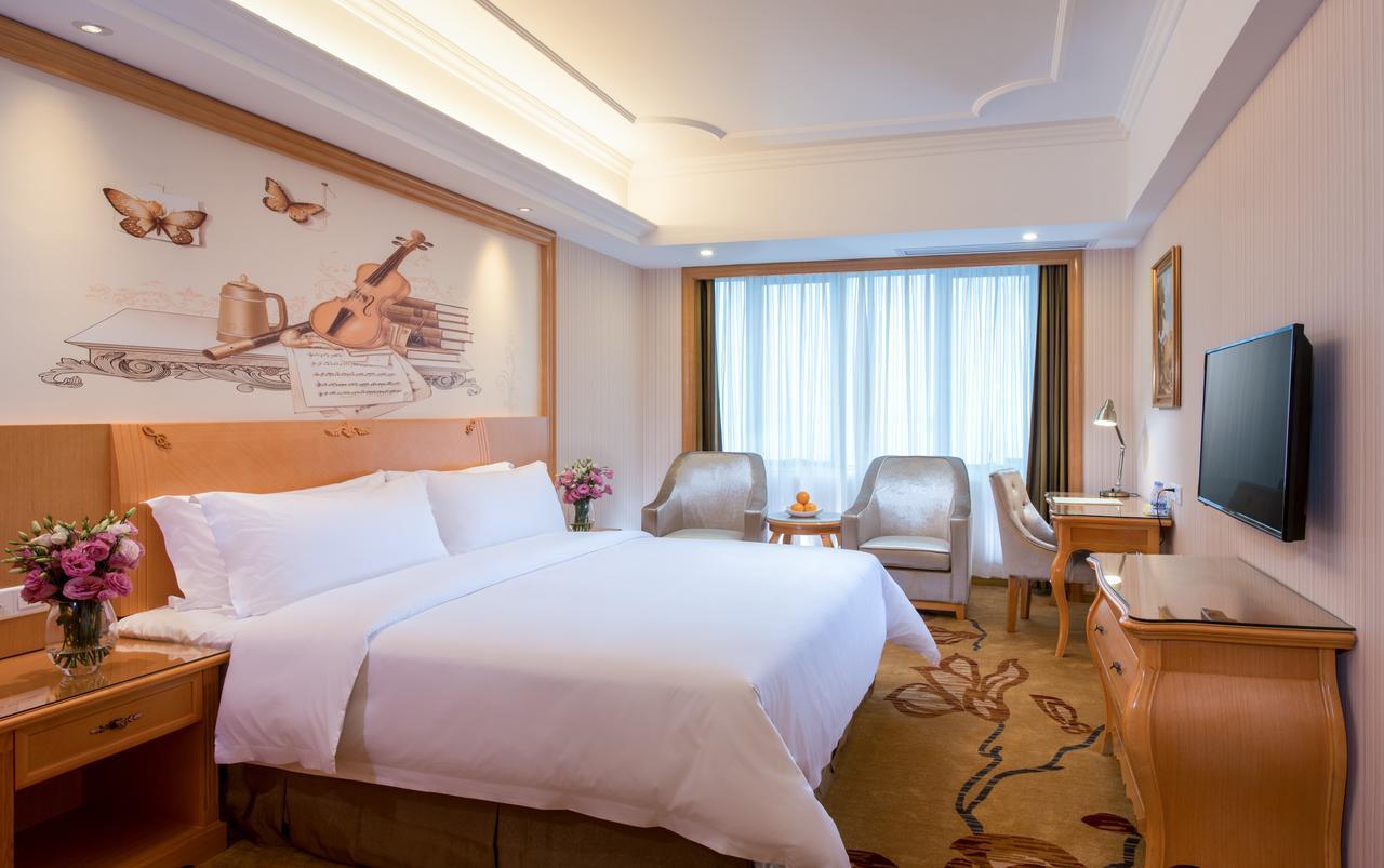 Vienna International Hotel - Expo Branch Shanghai Bagian luar foto
