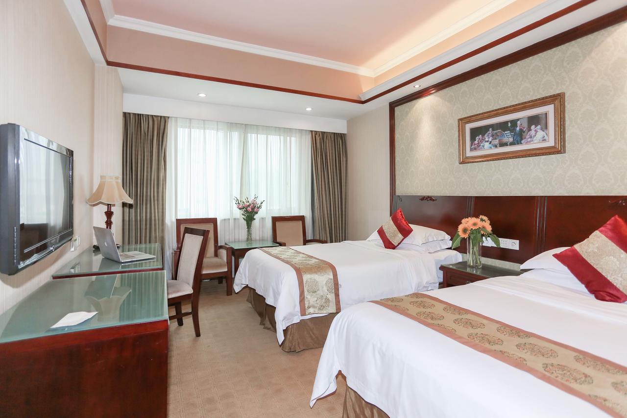 Vienna International Hotel - Expo Branch Shanghai Bagian luar foto