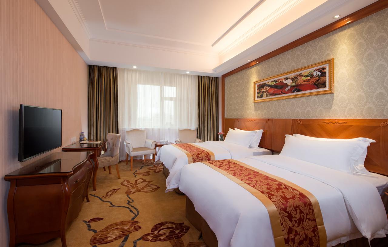 Vienna International Hotel - Expo Branch Shanghai Bagian luar foto