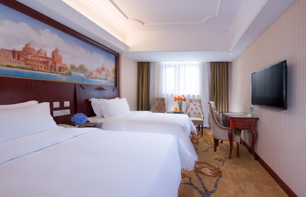 Vienna International Hotel - Expo Branch Shanghai Bagian luar foto